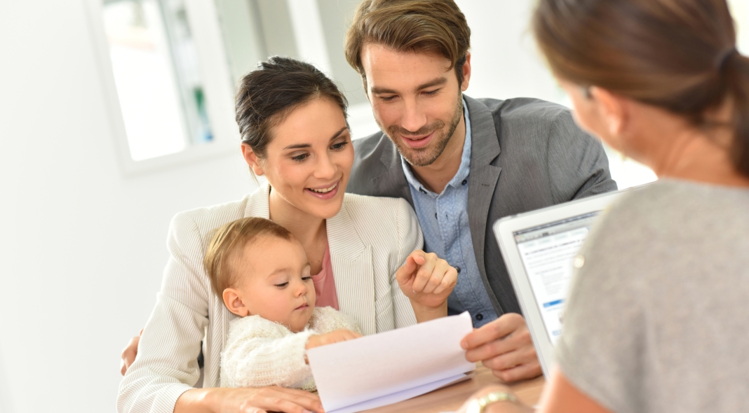 Family meeting real-estate agent for house investment